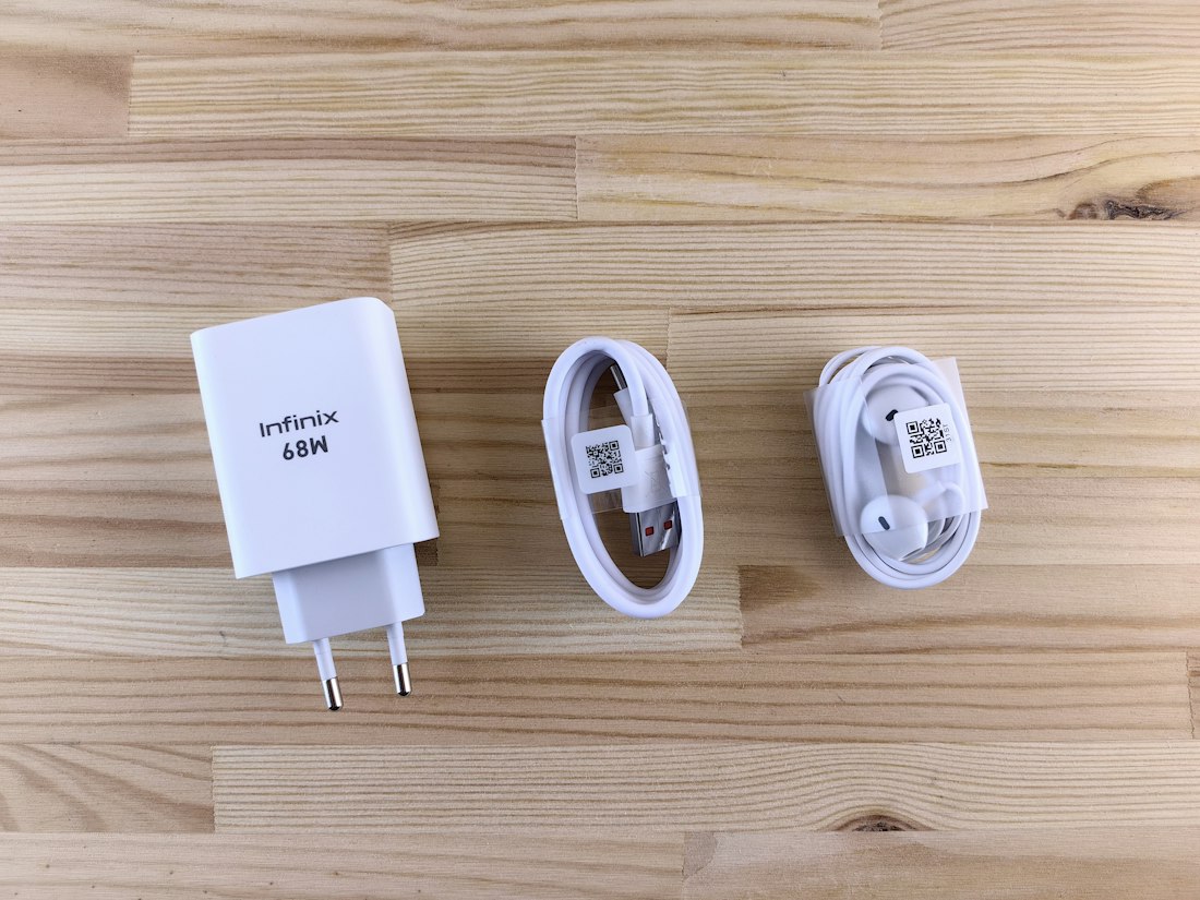 Charging adapter and USB cables on a table